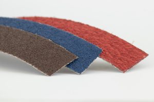 Abrasive belts for the production of lamellar discs